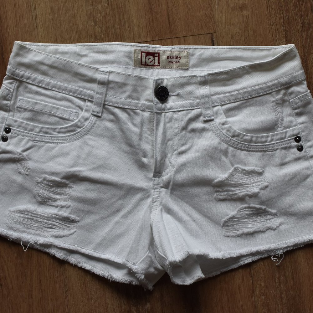 White distressed shorts